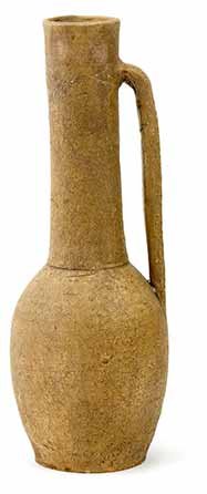 Tall handmade terracotta vessel